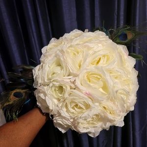 Beautiful handmade bouquet with peacock feathers.